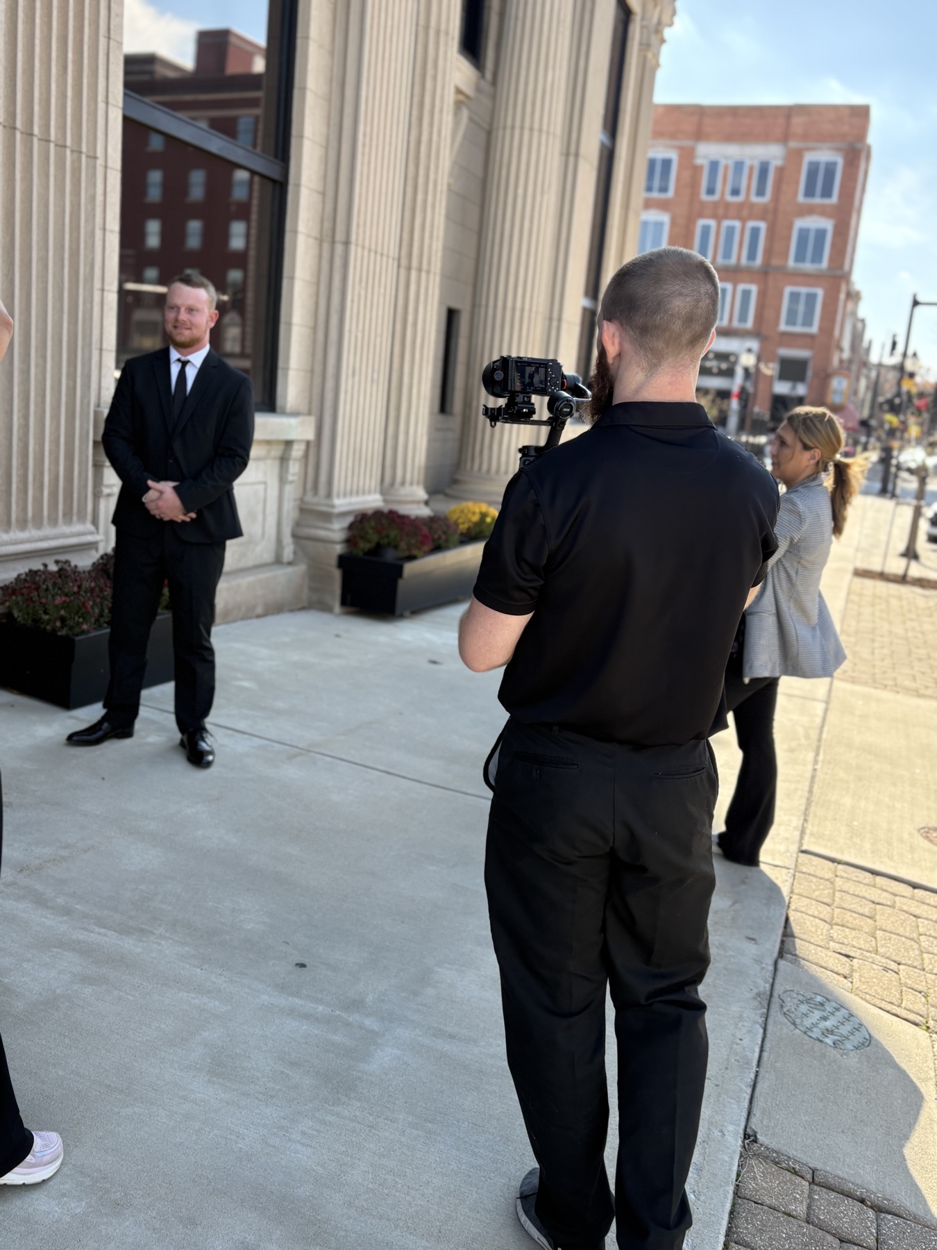 Josh filming a wedding on location