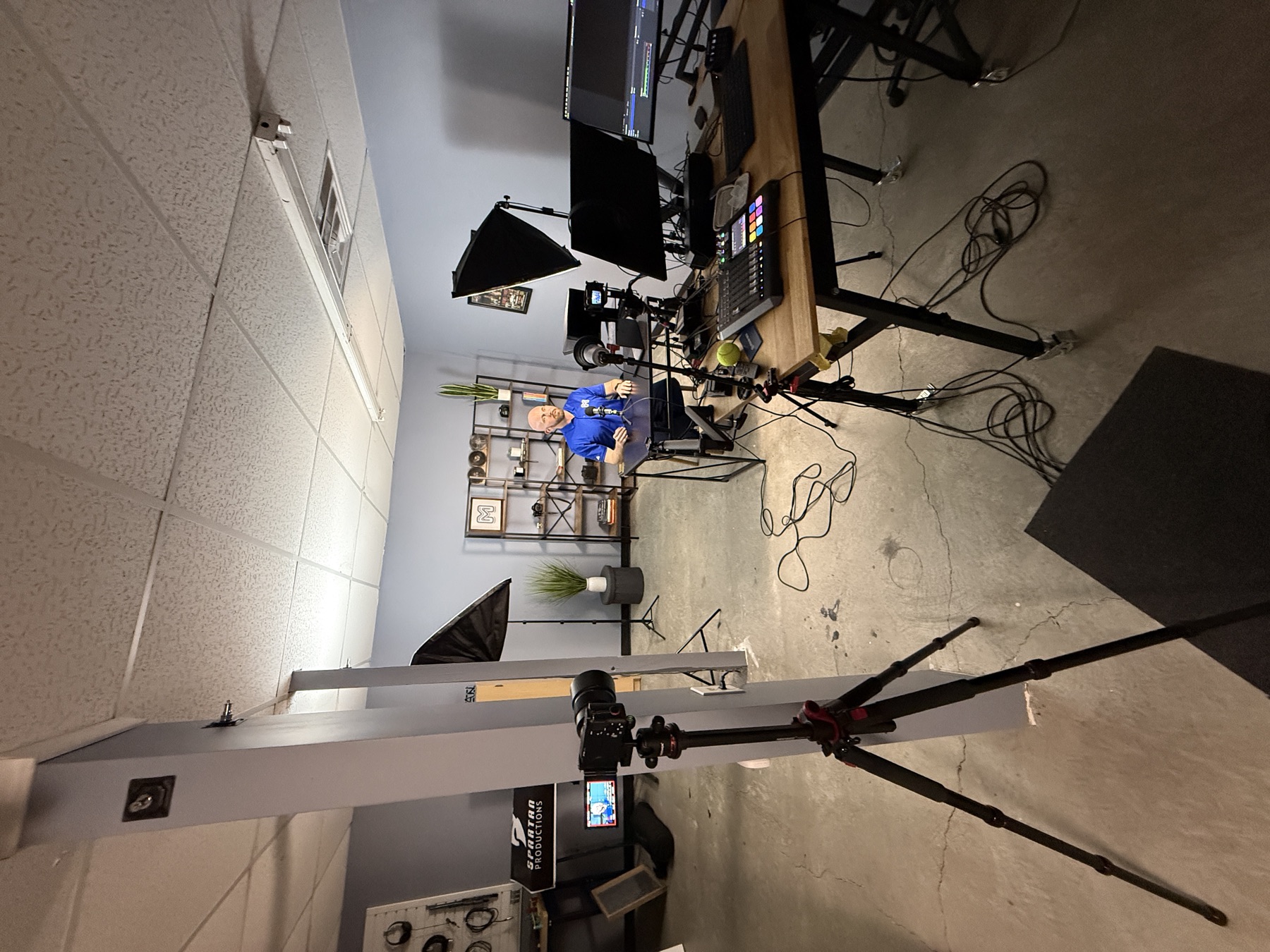 Cameras, lights, and sound set up for a solo recording in Spartan Studio