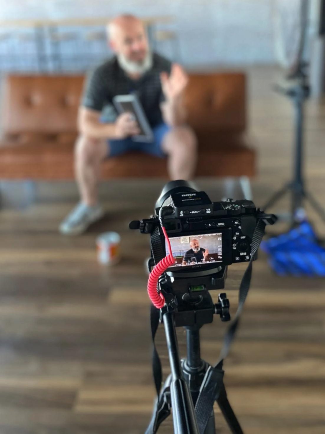 Spartan Productions camera filming an interview on set